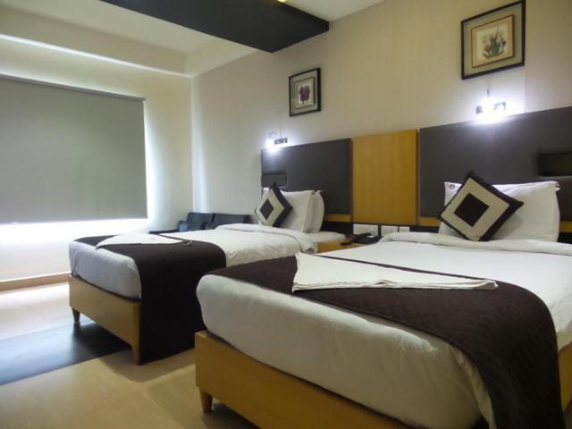 Mayas Kem Pride Hotel Tiruchirappalli Bagian luar foto